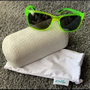 Green Oakley sunglasses